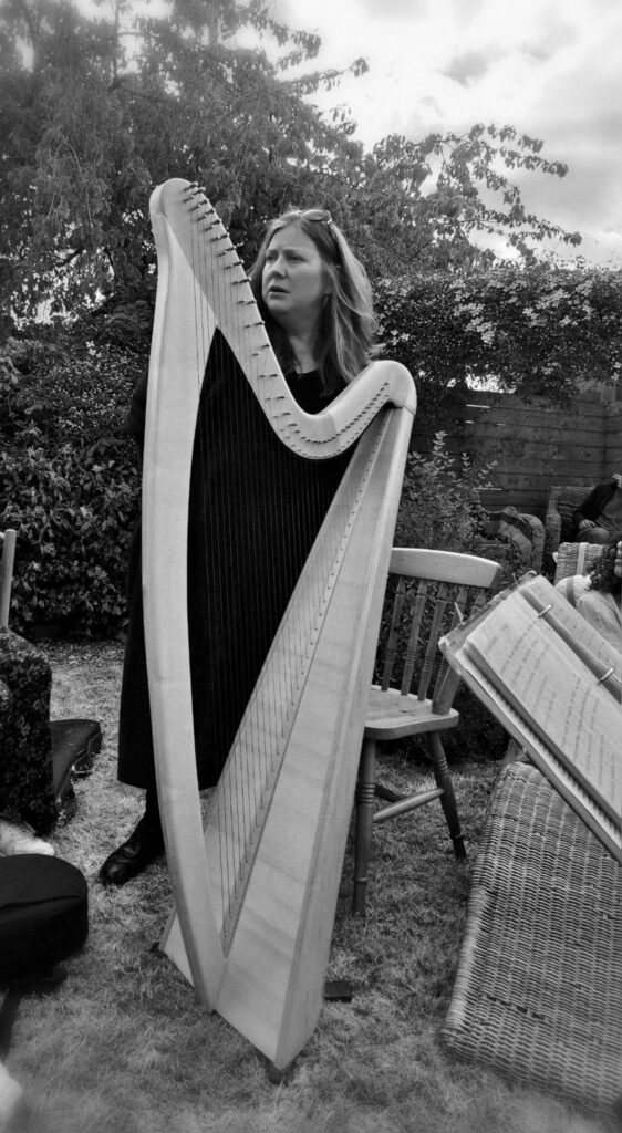 Sylvia Crawford with harp. photo: Brenda Malloy